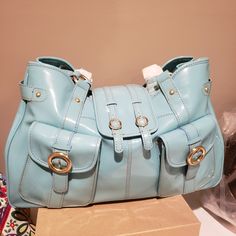 Nwt Still Wrapped Up, Dustbag Included. Smoke Free/Pet Free Storage. Approx. 15" Wide 8" Tall And 6" Deep Light Robin's Egg Or "Tiffany" Blue. Never Used. Barely Handled. I Can't Find A Blue One Online Anywhere To Price Compare. Selling On Behalf Of My Handbag Collector Grandmother, Who Says This Is A Rare Bag Not Many Made Or Sold. Light Blue Shoulder Bag With Double Top Carry Handles, Light Blue Shoulder Bag For Shopping, Blue Large Capacity Shoulder Bag For Office, Light Blue Tote Shoulder Bag With Top Carry Handle, Light Blue Tote Satchel For Shopping, Light Blue Leather Shoulder Bag With Top Carry Handle, Light Blue Office Bag With Detachable Strap, Light Blue Satchel With Adjustable Strap And Double Handle, Light Blue Satchel Bag For Shopping