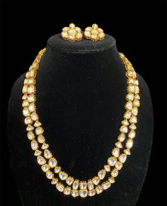 Premium quality kundan necklace set with stunning studs. The necklace is adjustable to your desired length. Perfect for both, everyday wear or special occasions. The set is beautifully designed to complement any outfit, adding a touch of elegance and sophistication to your look.  The necklace set makes for an ideal gift for yourself or a loved one. Gold Jewelry With Dori Work For Wedding, Gold Bollywood Jewelry With Dori Work, Festive Gold Kundan Necklace With Dori Work, Elegant Kundan Necklace With Dori Work For Festive Occasions, Gold Kundan Necklace With Dori Work For Diwali, Bollywood Style Party Jewelry With Dori Work, Elegant Jewelry With Dori Work For Festivals, Kundan Necklace With Mirror Work For Celebration, Temple Jewelry Kundan With Dori Work