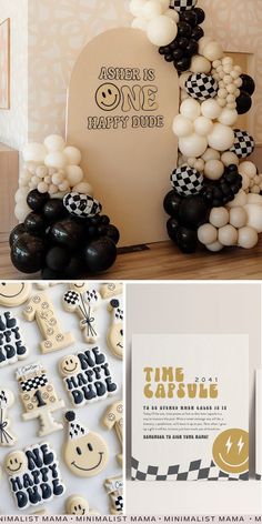 an assortment of black and white balloons in the shape of letters, numbers, and faces