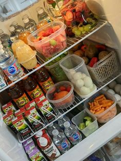 an open refrigerator filled with lots of food