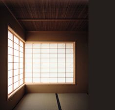 an empty room with tatami mats in it