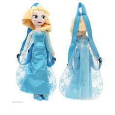 two frozen princess dolls, one with blonde hair and the other wearing blue gowns