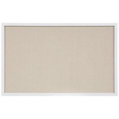 a white frame with a beige fabric covering on the front and back sides, hanging on a wall