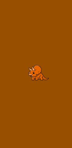 an orange dinosaur on a brown background