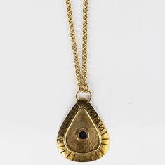 Fearless style—a symbol of beauty and poise, don the hammered Brass Mvua Pendant Necklace to transform your everyday. Handcrafted in Nairobi by skilled artisans using traditional techniques with Trinity Jewelry Crafts in Kenya. Brass Pendant Jewelry With Polished Finish, Spiritual Brass Jewelry With Polished Finish, Oxidized Pendant For Meditation, Hammered Medallion Amulet Jewelry, Oxidized Finish Pendant For Meditation, Artisan Brass Jewelry With Oxidized Finish, Artisan Oxidized Brass Jewelry, Bronze Polished Brass Jewelry, Polished Bronze Brass Jewelry