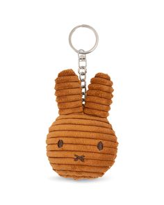 a brown teddy bear keychain on a white background