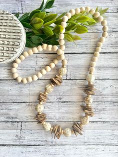 Neutral statement necklace, honey beige wood necklace, coconut chip bead, wood statement necklace. An easy necklace to add to any outfit! It measures approximately 30-31 inches. Lightweight wood and coconut chip beads with gorgeous ceramic accent beads.  Thanks for visiting BeadedBlues! Easy Necklace, Diy Jewelry To Sell, Costume Necklace, West Lafayette, Christmas Tree Earrings, Costume Necklaces, Hippie Necklace, Wooden Necklace, Wood Necklace