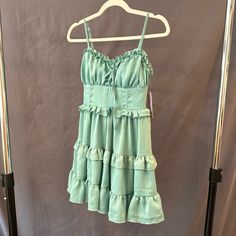 Aqua Green Wild Fable Sleeveless Short Dress With Adjustable Straps. New With Tags. Green Mini Dress With Ruffled Straps For Vacation, Green Vacation Mini Dress With Ruffled Straps, Green Ruffled Straps Sundress For Spring, Green Sundress With Ruffled Straps, Green Mini Sleeveless Dress With Ruffles, Green Sleeveless Mini Dress With Ruffles, Green Sleeveless Ruffled Sundress, Green Sleeveless Sundress With Ruffles, Green Lined Sleeveless Summer Dress