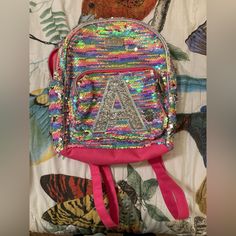 Great Condition Still Has Plastic From Tag-No Paper Tag Never Used Letter “A” Is On It Cute Multicolor Backpack For School Events, Trendy Multicolor Bags For School Events, Fun Multicolor Backpack For School Events, Trendy Multicolor School Bags, Casual Multicolor Backpack For School Events, Justice Bags, Justice Backpacks, Justice Accessories, Sequin Backpack