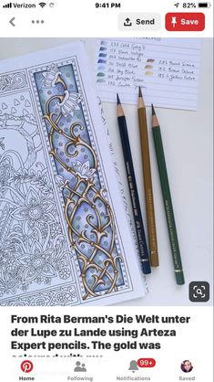 an image of a coloring book with two pencils and some other items on it