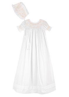 Elizabeth Smocked Christening Gown | Over The Moon Smocked Sleeve, Christening Gown, Bride Flowers, Christening Gowns, Bridal Fashion Week, French Seam, Fabric Covered Button, Little White Dresses, Over The Moon