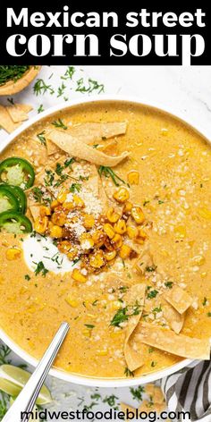 mexican street corn soup in a bowl with tortilla chips