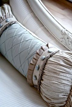 a close up of a decorative object on a bed