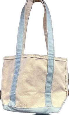 Casual Light Blue Rectangular Shoulder Bag, Light Blue Square Shoulder Bag For Daily Use, Trendy Blue Square Canvas Bag, Light Blue Square Bag For Daily Use, Casual Light Blue Everyday Bag, Blue Large Capacity Canvas Bag For Spring, Everyday Light Blue Shoulder Bag With Handles, Everyday Light Blue Rectangular Bag, Everyday Light Blue Rectangular Shoulder Bag