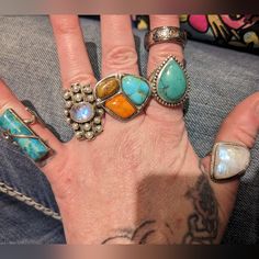 I Have 10 Antique Solid 925 Sterling And Turquoise Rings, If You Would Like Them All, Or Just A Couple Or Just One Let Me Know They All Have Theyr Boxes And The Stones Are Real, Except The Thick One With The Red Stones In The Flowers I'm Not Sure About That One, There Is The One Moonstone, Also I Have Sets Of Rings Earrings Necklaces And Bracelets... , I Have Tons Of Turquoise And 935 Sterling Jewelry Bracelets Necklaces Earrings None Are Plated. If You Would Like To Look At Other Items Message Me On Here. Smoke And Pet Free Home Make An Offer Only If Its Realistic And Reasonable, Please Dont Sent Rediculous Low Ball Offes You Will Be Ignored. Sterling Silver Turquoise Ring With Gemstone Accents, Blue Turquoise Ring With Gemstone Accents In Sterling Silver, Turquoise Spiritual Gemstones In Sterling Silver, Spiritual Turquoise Gemstones In Sterling Silver, Blue Multi-stone Turquoise Ring In Sterling Silver, Artisan Sterling Silver Open Ring Jewelry, Fine Gemstones For Jewelry Making, Fusion Style Turquoise Sterling Silver Jewelry, Unique Turquoise Gemstone Ring