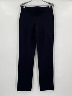 Quince Women's Ultra-Stretch Ponte Straight Leg Pants - New with tags Color: Black Size: Medium Petite - 28" Inseam 67% rayon, 28% nylon, 5% spandex 4-way stretch Wrinkle-resistant Faux front and back pockets Pull-on style with flat elasticized waistband and belt loops Measurements 15.5" Waist, laying flat 17" Hip, laying flat 10.5" Rise 28" Inseam Fitted Straight Pants With Pull-on Style, Stretch Tapered Leg Chinos For Work, Elastane Pull-on Pants, Pull-on Elastane Pants, Fitted Straight Leg Leggings With Pockets, Stretch Straight Chinos For Work, Fitted Wide Leg Pull-on Dress Pants, Fitted Pull-on Full Length Pants, Full Length Stretch Workwear Pants