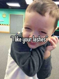 a little boy that is holding his head with the caption i like your lashes