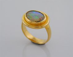 Yowah Opal 12 mm x 10 mm set in an 18K Yellow Gold by sasajewelry, $8000.00 **setting** Formal Yellow Gold Ethiopian Opal Ring, Formal Ethiopian Opal Cabochon Ring, Australian Opal Ring, Yowah Opal, Yellow Gold Setting, Opal Ring, Australian Opal, Smokey Quartz, Quartz Pendant