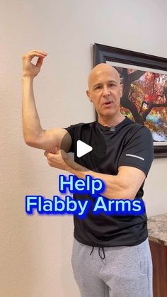 a man holding his arm up in the air with words help flabby arms