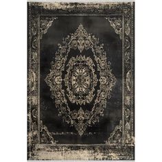 an old black and white rug with ornate designs on the bottom, in front of a white background