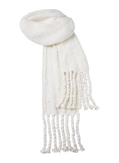 The Lily Scarf is handknit from a luxurious blend of cashmere, silk, and wool in a soft white hue. This oversized scarf features voluminous tassels and a brushed texture, showcasing artisanal craftsmanship with every stitch. Shop Accessories. Styling Tip: Drape over a tailored coat or chunky knit for a cozy yet elevated cold-weather look. Chunky White Scarf, White Knitted Scarf, Statement Necklace Outfit, Accessories Styling, Necklace Outfit, Stitch Shop, White Scarf, Tailored Coat, White Scarves