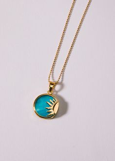 LOGAN TAY BLUE TRANSPARENT SUN NECKLACE Kendra Scott Gold Necklace Blue, Affordable Blue Everyday Necklace, Affordable Blue Everyday Jewelry, Cheap Blue Everyday Jewelry, Affordable Everyday Blue Jewelry, Cheap Everyday Blue Jewelry, Affordable Blue Symbolic Necklace, Blue Sun And Moon Pendant Necklace, Blue And Gold Jewelry