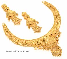 Gold Jewelry Simple Necklace Tarinika Jewelry, Luxury Gold Sets With Motifs, Luxury 22k Gold Round Temple Necklace, Luxury 22k Gold Jewelry For Diwali, Luxury 22k Gold Bollywood Necklace, Luxury 22k Gold Round Necklace, Luxury Yellow Gold Chandbali Temple Necklace, Luxury 22k Gold Necklace, Luxury Yellow Gold Necklace For Puja