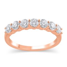 From the REEDS Exclusive ECONIC Diamond collection, this stunning 14k rose gold anniversary ring is the perfect and complete gift to celebrate your romantic journey together. The anniversary ring boasts seven sparkling round ECONIC lab grown diamonds in a prong setting. The lab grown diamonds are 1ctw, I in color, and SI1 in clarity. The anniversary ring is 3mm across the top and 2mm at the bottom. REEDS exclusive ECONIC Diamonds are lab grown in a technologically advanced facility, allowing us Rose Gold Diamond Ring Channel Set For Anniversary, Rose Gold Channel Set Diamond Ring For Anniversary, Gold Anniversary Bands, Gold Anniversary Rings, Wedding Day Jewelry, Engagement Ring Guide, Gold Anniversary, Diamond Collection, Anniversary Bands