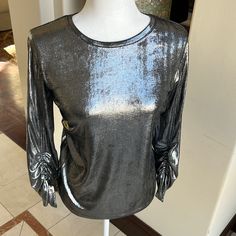 Nwt Beautiful Silver Metallic Le Gali Blouse. Shimmers In The Light. Light And Soft To The Touch. Size M. Casual Metallic Party Tops, Glamorous Metallic Tops For Fall, Metallic Long Sleeve Tops For Work, Metallic Long Sleeve Tops For Fall, Metallic Fitted Blouse For Night Out, Metallic Stretch Elegant Tops, Elegant Metallic Stretch Top, Chic Metallic Long Sleeve Blouse, Chic Long Sleeve Metallic Blouse