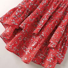 Red Ruffle Detail Irregual Hem Maxi Skirt Red Tiered Skirt Dress With Lined Skirt, Red Dress With Flowy Skirt And Ruffles, Red Mini Skirt Dresses For Spring, Red Dress With Ruffles And Flowy Skirt, Red Ruffled Bottoms For Summer, Red Dress With Ruffled And Flowy Skirt, Red Ruffled Skirt For Summer, Red Tiered Skirt For Summer, Red Casual Skirted Dress