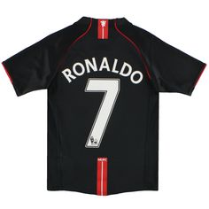 a black jersey with the number seven on it and red trimmings, in front of a white background