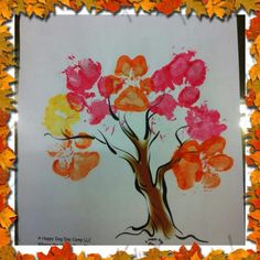 an art project for kids that uses leaves and paint to create a tree with hearts