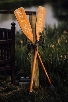 Personalised oars for wedding decor at Houghton Lodge Wedding Canoe Decor, Wedding At The Lake Ideas, Rustic Lakeside Wedding, Lake Woods Wedding, Fall Fishing Wedding, Kayak Wedding Theme, Lake Wedding Decorations Diy, River Theme Wedding, Simple Lakeside Wedding