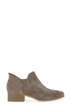 A soft suede bootie features stretchy gore panels for easy on-offs along with a cushioned footbed and a stacked block heel. 1 1/2" heel 4 1/2" shaft; 6 1/2" calf circumference Cushioned insole Leather and textile upper/synthetic lining/rubber sole Imported Kenneth Cole Reaction, Ankle Bootie, Suede Booties, Soft Suede, Kenneth Cole, Ankle Booties, Bootie, Block Heels, Rubber Sole