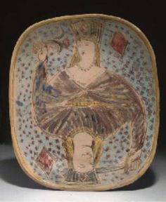 a decorative bowl with two women on it