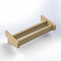 an unfinished wooden shelf sitting on top of a white surface