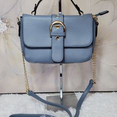 Ra0777bl Every Detail Of A Crossbody Bag Is Carefully Designed Made With Soft Synthetic Leather ,Solid-Colored Fabric Lining Dimension: 8.5"(L) X 4"(W) X 5.6"(H) Inches. Comes With Detachable 48" Shoulder Drops. Light Blue Formal Crossbody Bag, Formal Light Blue Crossbody Bag, Blue Satchel Flap Bag For Shopping, Blue Formal Satchel With Branded Hardware, Light Blue Formal Bags With Gold-tone Hardware, Formal Light Blue Bags With Gold-tone Hardware, Blue Top Handle Flap Bag With Adjustable Strap, Blue Flap Bag With Adjustable Strap For Formal Occasions, Light Blue Formal Crossbody Shoulder Bag