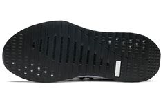 the sole of a pair of black shoes