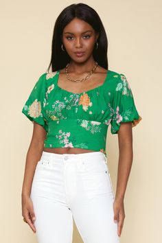 This floral-print crop top offers the pop your season needs. It has a sweetheart neckline and bubble sleeves for a bit of drama. Wear it with our matching maxi skirt or high-waisted jeans. •Sweetheart neckline •Bubble sleeves •Hidden side zip Item Number: 45175 Bubble Sleeve Top, Floral Print Crop Top, Bubble Sleeve, Print Crop Tops, Kelly Green, Item Number, Sweetheart Neckline, High Waist Jeans, Side Zip