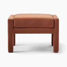 the foot stool is made out of brown fabric