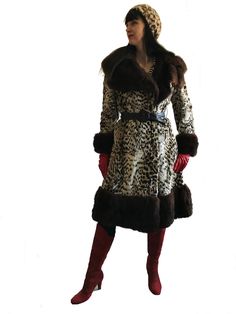 a very elegant vintage 1960s 70s leopard print winter coat made of genuine fur  this Mod Boho coat is so beautifully made of high quality genuine fur with a gorgeous leopard print and with a large chocolate brown fur collar, cuffs and trimming around the hem.  you can fold the collar upwards for more dramatic effect and warmth. the coat is lined with gold beige satin fabric, it has three hook closures (belt is not included) two hidden pockets. label : fur salon The May Cleveland USA in excellent Luxury Long Sleeve Leopard Print Outerwear, Fitted Faux Fur Outerwear In Leopard Print, Fitted Leopard Print Faux Fur Outerwear, Elegant Winter Leopard Print Outerwear, Elegant Leopard Print Winter Outerwear, Elegant Leopard Print Outerwear For Winter, Fitted Leopard Print Winter Outerwear, Leopard Print Fur Coat With Faux Fur Trim, Luxury Leopard Print Outerwear For Fall