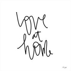 the words love at home written in black ink