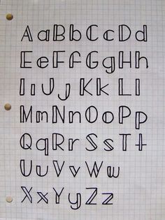 an old fashioned handwritten alphabet is shown on a piece of paper with holes in it