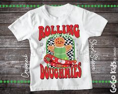 'Rolling with my Doughmies' Retro Style Christmas shirt for girls. Available is sizes 0-3 Month to Youth 14-16. See photos for size chart. This shirt is made of 100% polyester but has the look and feel of cotton.  CARE INSTRUCTIONS - Turn Garment Inside Out - Machine Wash Cold with Mild Detergent - No Bleach - No Fabric Softener - Cool or Air Dry PRODUCTION TIME & SHIPPING * The production time for your order is estimated at 1-2 business days. * All orders are dispatched via USPS Ground Advantag Retro Christmas Shirt, T Shirts For Girls, Christmas T Shirts, Funny Christmas Shirts, Retro Christmas, Fabric Softener, Funny Christmas, Kids Tops, Christmas Shirt