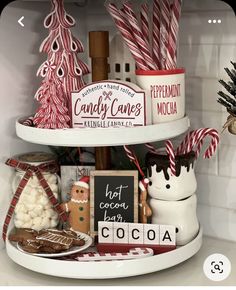 some candy canes and cookies on a shelf