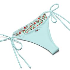 Stay comfortable and stylish all summer with this All-Over Print Recycled String Bikini set. It’s made from soft recycled polyester with double-layering and UPF 50+. Style the straps how you like, and get ready to swim! • Soft and stretchy material with UPF 50+ • Sizes up to 6XL • Bikini top comes with removable padding for comfort • Multiple ways to tie and style the bikini set • Color design options for swimwear lining Disclaimers: • Due to the 2-layered construction and internal stitching, a visible stitch may appear in the crotch seam of the bikini bottom. This is a normal part of the manufacturing process and does not impact the quality or performance of the product. • To make your All-Over Print Recycled String Bikini last longer, thoroughly rinse it off after each use and get rid of Seamless Summer Swimwear With Tie-side Bottom, Seamless Tie-side Summer Swimwear, Seamless Tie-side Bottom Swimwear For Summer, Summer Tankini With Adjustable Straps And Tie-side Bottom, Summer Stretch Tie-side Swimwear Bottom, Stretch Tie-side Bottom Swimwear For Summer, Stretch Summer Swimwear With Tie-side Bottom, Adjustable Tankini For Sunbathing In Summer, Spring Seamless Swimwear With Tie-side Bottom