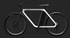 a white and black bike on a dark background