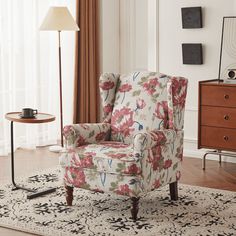 a living room filled with furniture and a lamp