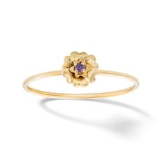 Unleash your inner flower child. This February birth flower ring is perfect for adding a touch of whimsy to your style. Made in responsibly sourced 10K solid yellow gold for everyday wear. Stone: Cubic Zirconia Stone Size: 1.5 mm Flower Size: 6 mm 14k Yellow Gold Flower Ring With Birthstone, 14k Yellow Gold Rings With Birth Flower Detail, Yellow Gold Flower Ring With Birthstone In 14k Gold, Adjustable Yellow Gold Flower Ring Fine Jewelry, Yellow Gold Birthstone Flower Ring, Delicate Stackable Yellow Gold Flower Ring, Delicate Yellow Gold Stackable Flower Ring, Yellow Gold Flower Ring With Birthstone, Yellow Gold Flower Ring With Gemstone For Promise