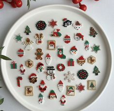 a white plate topped with lots of christmas decorations